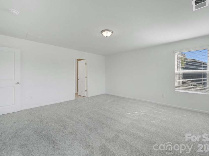1354 Fremont Drive, Wingate, NC 28174.  MLS# CAR4391046, YatesRealty ID 30610. Owner's suite