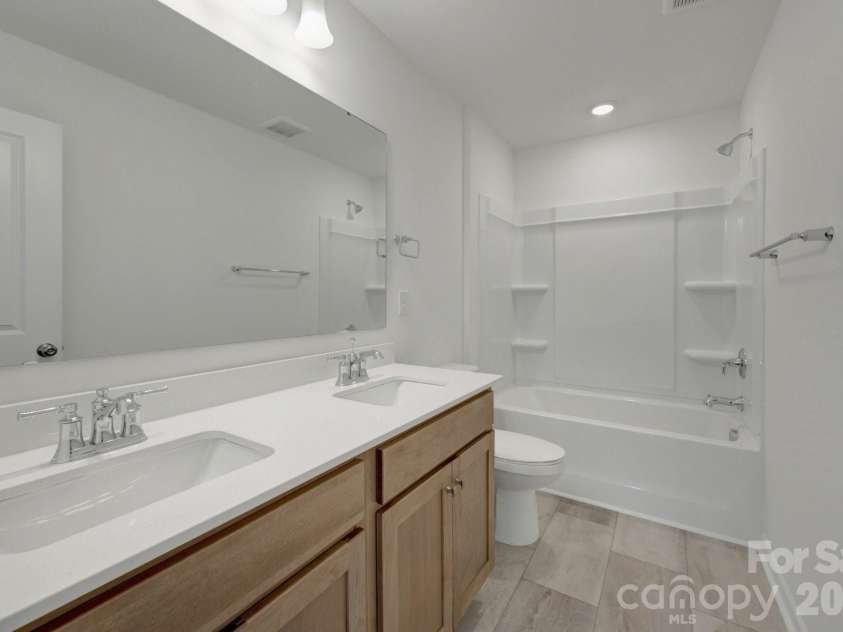 1354 Fremont Drive, Wingate, NC 28174.  MLS# CAR4391046, YatesRealty ID 30610. Secondary bathroom