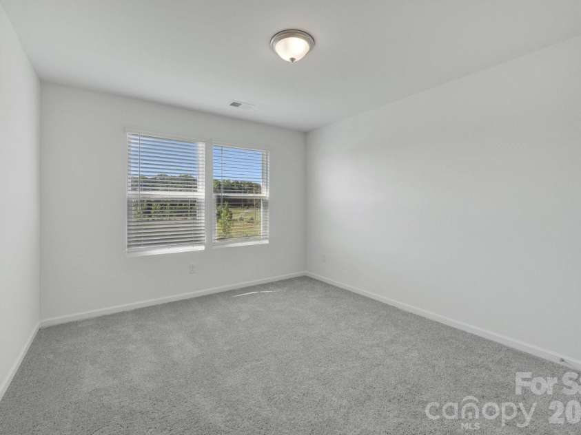 1354 Fremont Drive, Wingate, NC 28174.  MLS# CAR4391046, YatesRealty ID 30610. Secondary bedroom