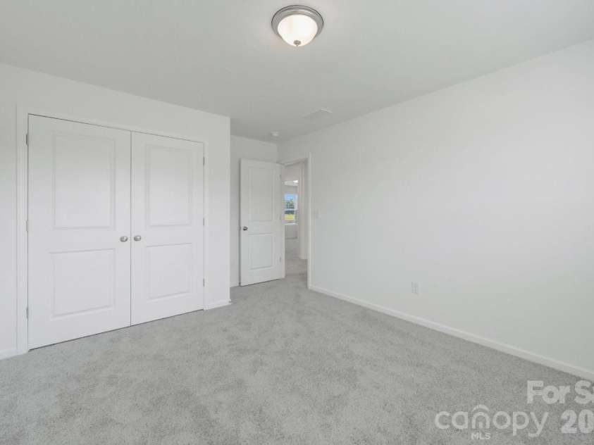 1354 Fremont Drive, Wingate, NC 28174.  MLS# CAR4391046, YatesRealty ID 30610. Secondary bedroom