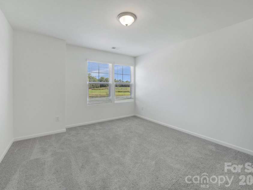 1354 Fremont Drive, Wingate, NC 28174.  MLS# CAR4391046, YatesRealty ID 30610. Secondary bedroom