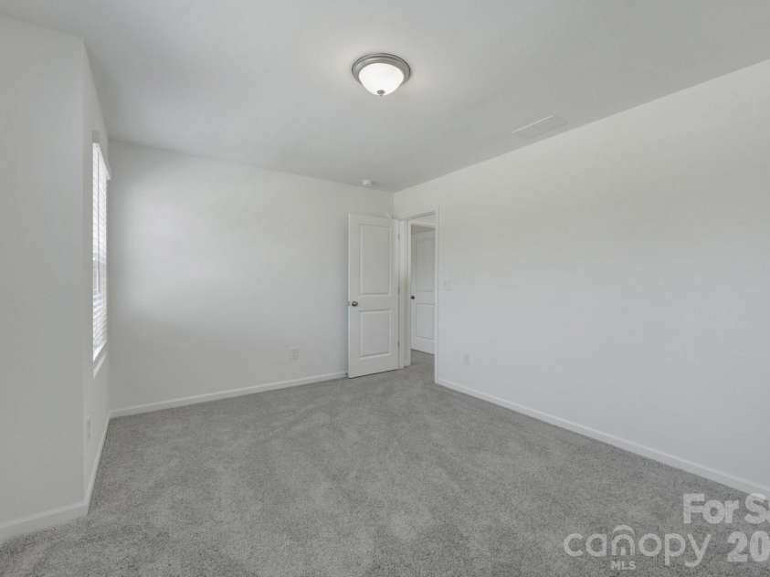 1354 Fremont Drive, Wingate, NC 28174.  MLS# CAR4391046, YatesRealty ID 30610. Secondary bedroom