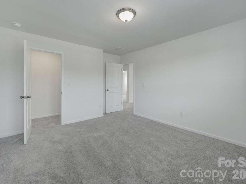 1354 Fremont Drive, Wingate, NC 28174.  MLS# CAR4391046, YatesRealty ID 30610. Secondary bedroom