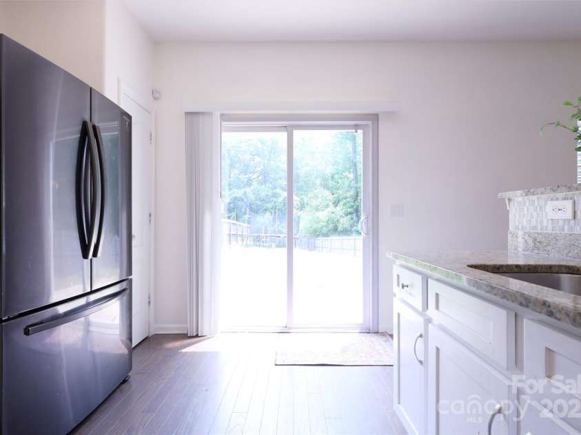 6919 Ware Road, Charlotte, NC 28212.  MLS# CAR4263043, YatesRealty ID 30611. Access to backyard from the Kitchen
