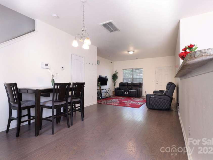 6919 Ware Road, Charlotte, NC 28212.  MLS# CAR4263043, YatesRealty ID 30611. Family Room and Dining  area