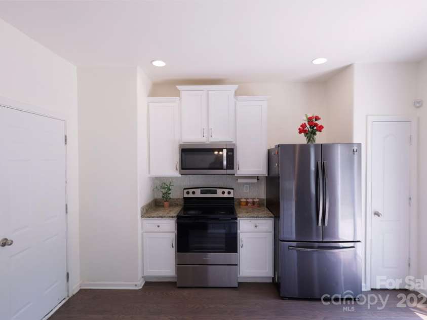 6919 Ware Road, Charlotte, NC 28212.  MLS# CAR4263043, YatesRealty ID 30611. Kitchen with newer appliances