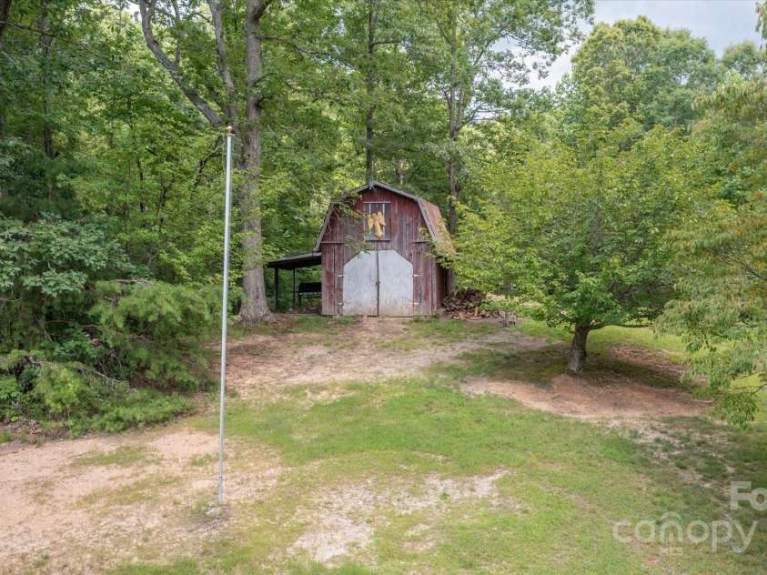 99 Holbert Mountain Road, Zirconia, NC 28790.  MLS# CAR4287675, YatesRealty ID 30612. 