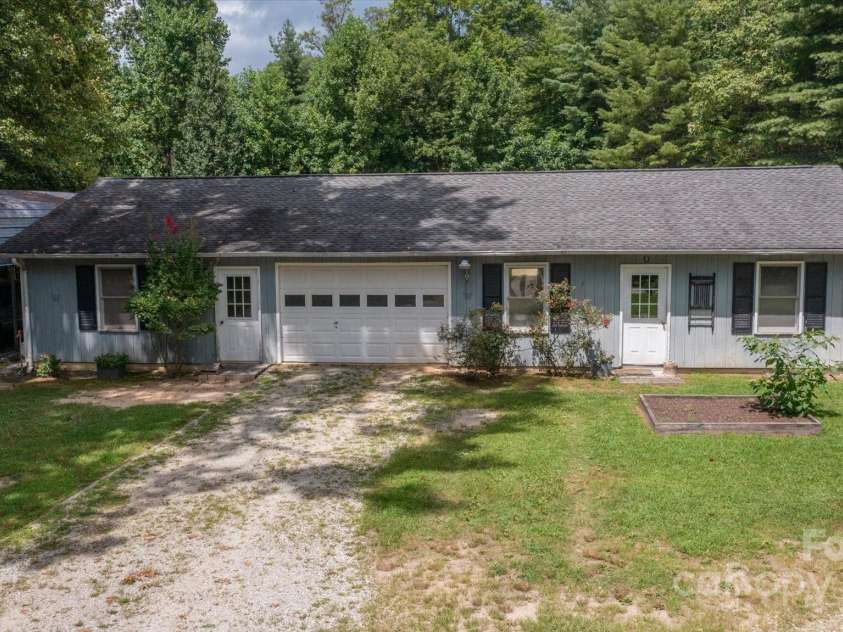99 Holbert Mountain Road, Zirconia, NC 28790.  MLS# CAR4287675, YatesRealty ID 30612. 