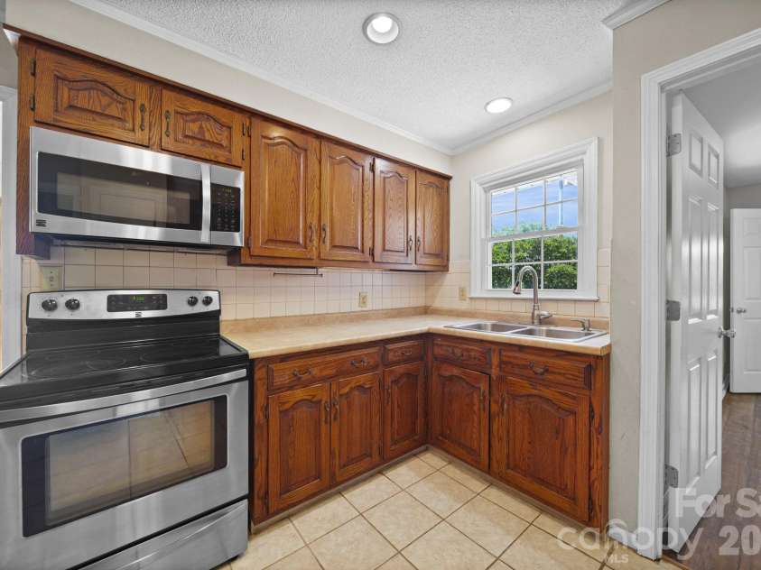 3003 Joe Griffin Road, Monroe, NC 28112.  MLS# CAR4390560, YatesRealty ID 30615. 