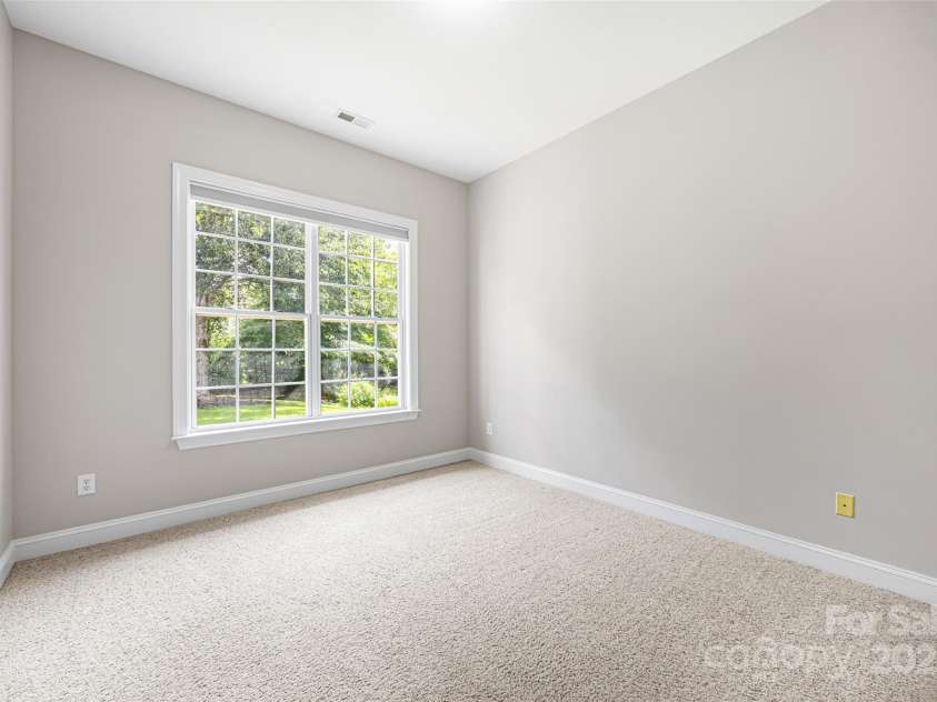 646 Quicksilver Trail, Fort Mill, SC 29708.  MLS# CAR4274446, YatesRealty ID 30616. Main level bedroom