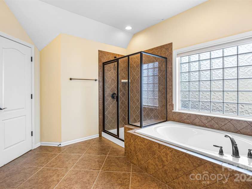 646 Quicksilver Trail, Fort Mill, SC 29708.  MLS# CAR4274446, YatesRealty ID 30616. Primary bathroom