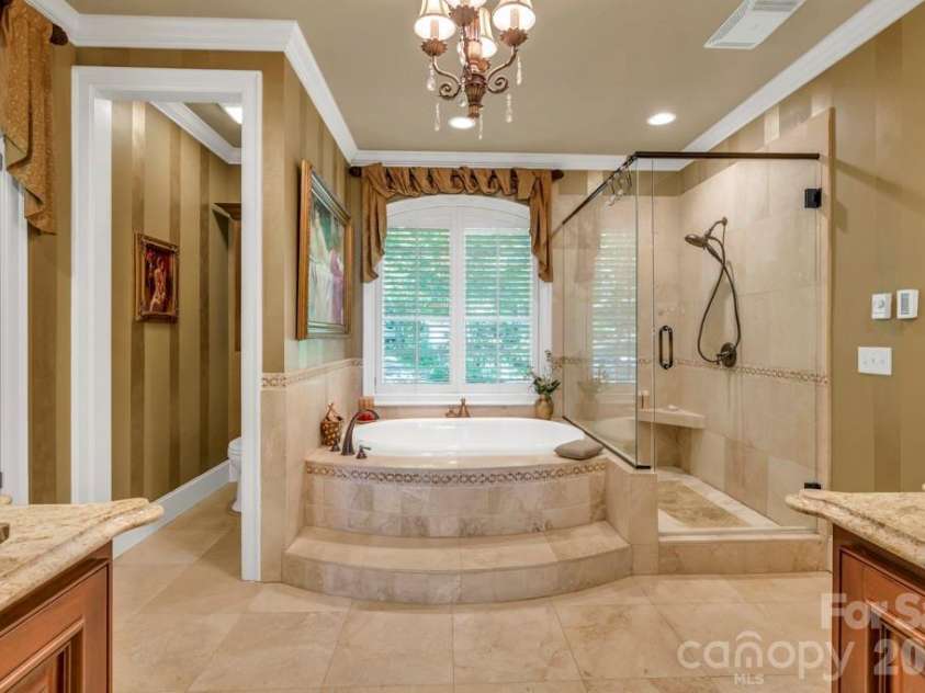 847 Old Orchard Road, Blowing Rock, NC 28605.  MLS# CAR4384622, YatesRealty ID 30618. Main-level primary suite bath