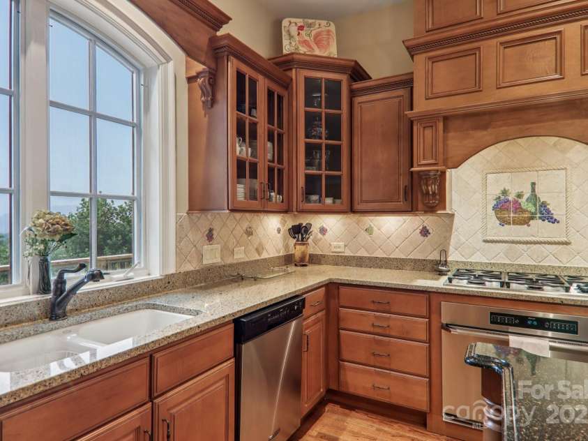 149 Cardinal Lane, Waynesville, NC 28786.  MLS# CAR4284459, YatesRealty ID 30625. Kitchen with mountain views