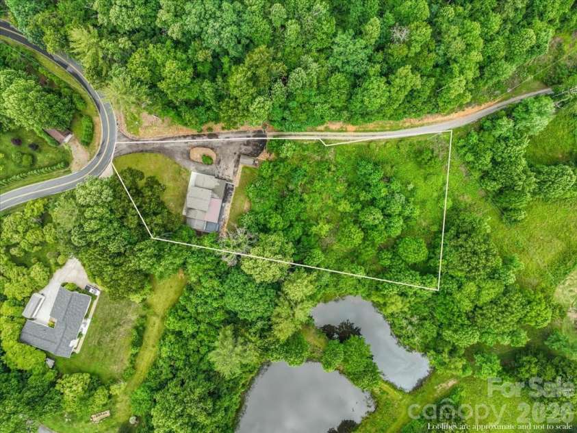 455 Rocky Springs Heights, Burnsville, NC 28714.  MLS# CAR4389023, YatesRealty ID 30625. 
