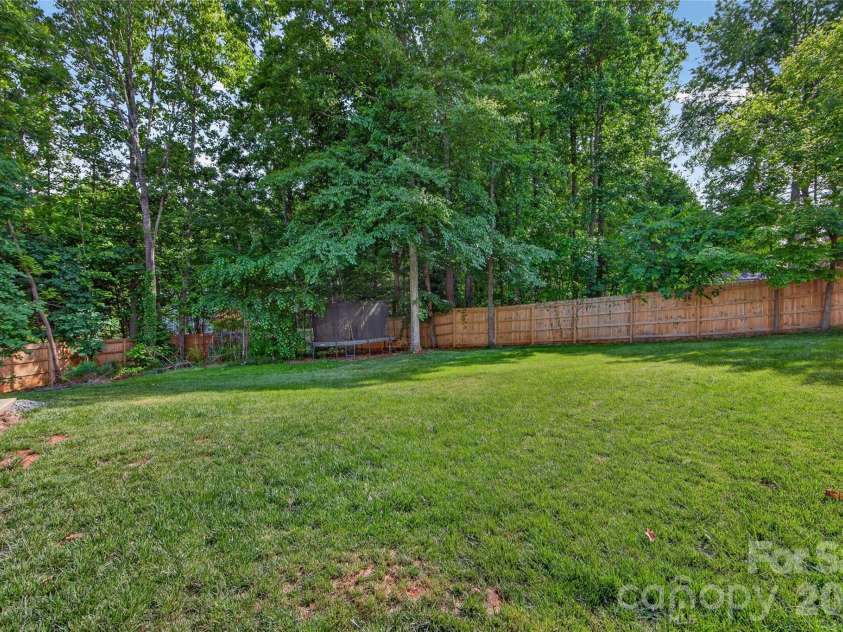 8628 Brookgreen Drive, Mint Hill, NC 28227.  MLS# CAR4380326, YatesRealty ID 30627. Rear back yard