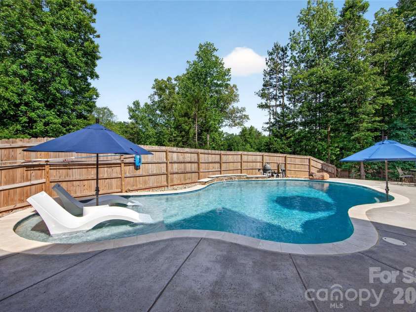 8628 Brookgreen Drive, Mint Hill, NC 28227.  MLS# CAR4380326, YatesRealty ID 30627. Salt water pool