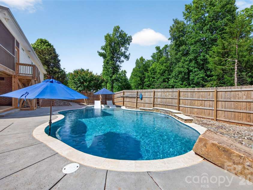 8628 Brookgreen Drive, Mint Hill, NC 28227.  MLS# CAR4380326, YatesRealty ID 30627. Salt water pool