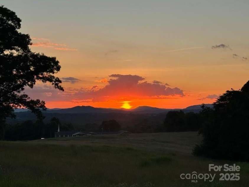 50 Berea Church Quincy Road, Hiddenite, NC 28636.  MLS# CAR4211002, YatesRealty ID 3063. Sunsets at side yard
