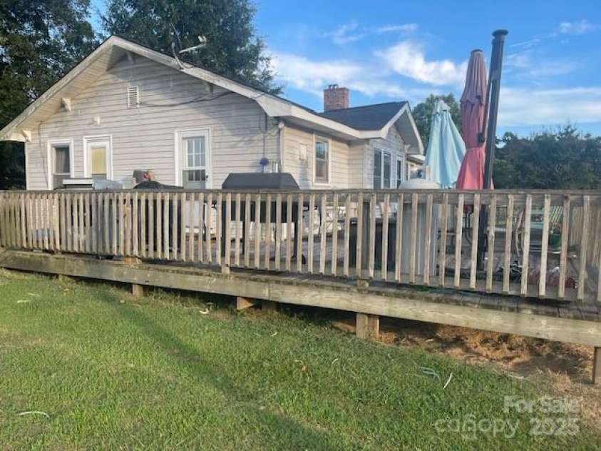 3513 Gilboa Road, Marshville, NC 28103.  MLS# CAR4283541, YatesRealty ID 30630. Wrap around deck
