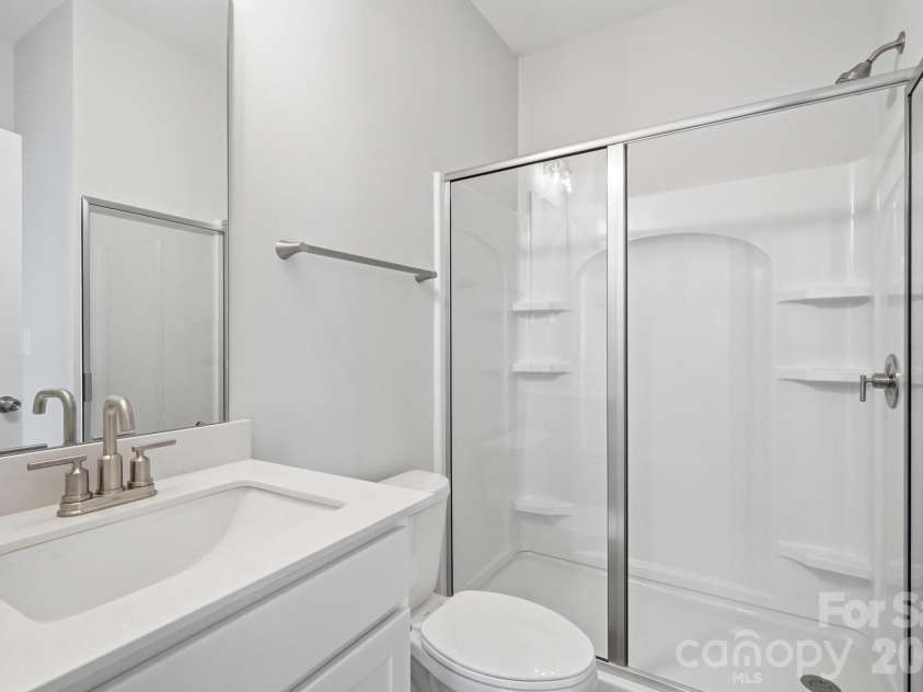 151 Grouse Run Way, Troutman, NC 28166.  MLS# CAR4382567, YatesRealty ID 30632. Guest Bathroom