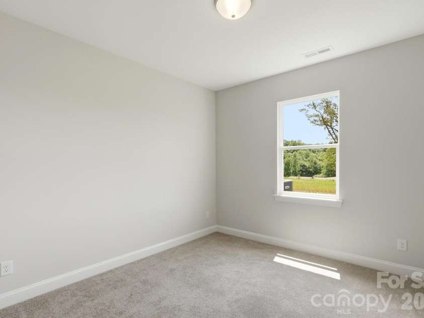 151 Grouse Run Way, Troutman, NC 28166.  MLS# CAR4382567, YatesRealty ID 30632. Guest Bedroom
