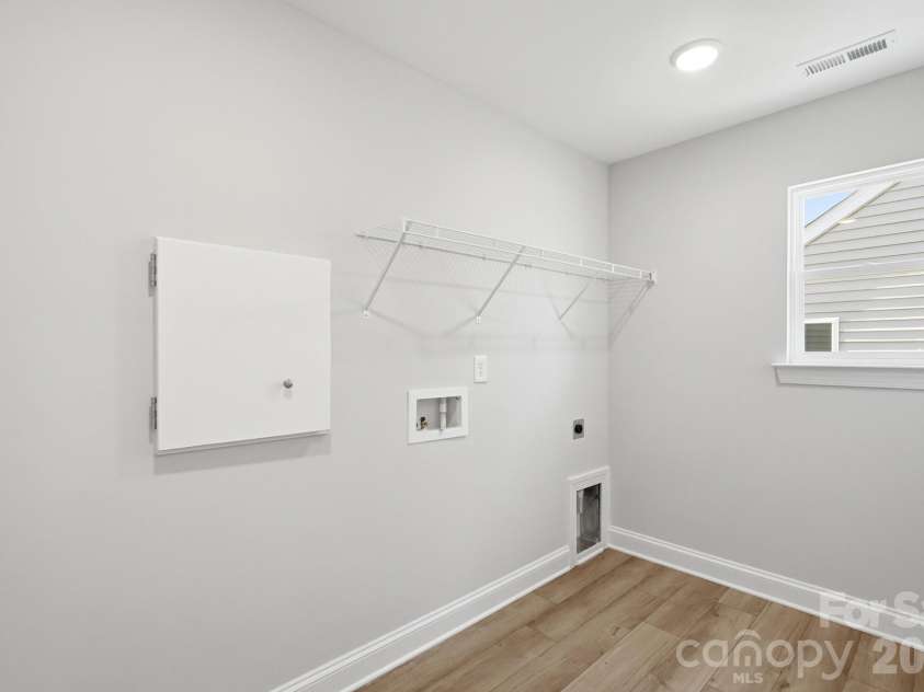 151 Grouse Run Way, Troutman, NC 28166.  MLS# CAR4382567, YatesRealty ID 30632. Laundry Room