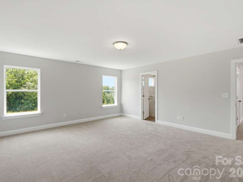 151 Grouse Run Way, Troutman, NC 28166.  MLS# CAR4382567, YatesRealty ID 30632. Primary Bedroom