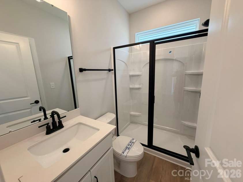 153 Grouse Run Way, Troutman, NC 28166.  MLS# CAR4383145, YatesRealty ID 30634. Guest Bathroom