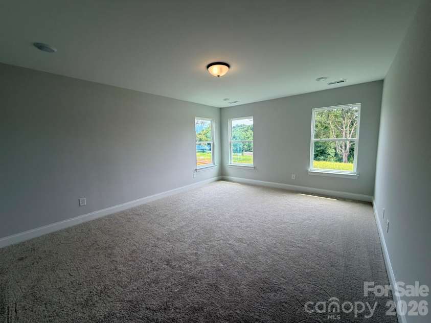 153 Grouse Run Way, Troutman, NC 28166.  MLS# CAR4383145, YatesRealty ID 30634. Primary Bedroom