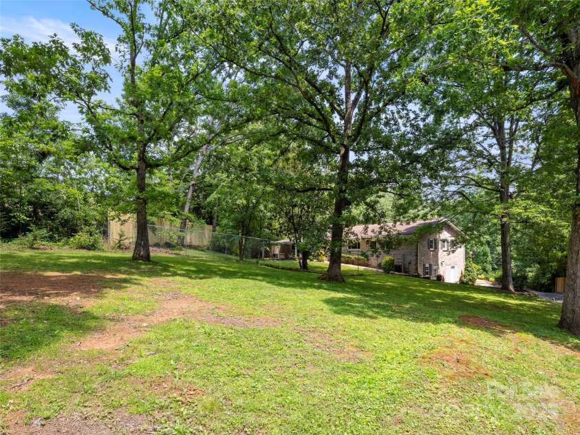 124 New Rockwood Road, Arden, NC 28704.  MLS# CAR4260829, YatesRealty ID 30638. 