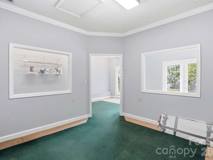 5519 Haybridge Road, Charlotte, NC 28269.  MLS# CAR4363610, YatesRealty ID 30638. Converted Garage