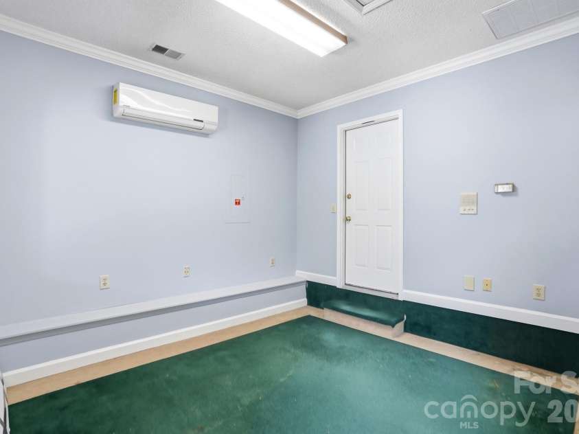 5519 Haybridge Road, Charlotte, NC 28269.  MLS# CAR4363610, YatesRealty ID 30638. Converted Garage