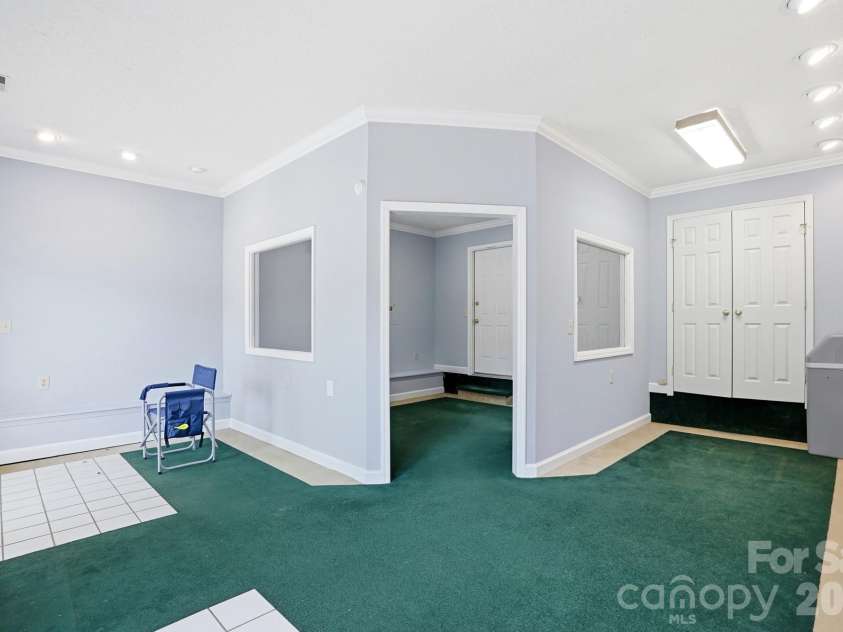 5519 Haybridge Road, Charlotte, NC 28269.  MLS# CAR4363610, YatesRealty ID 30638. Converted Garage