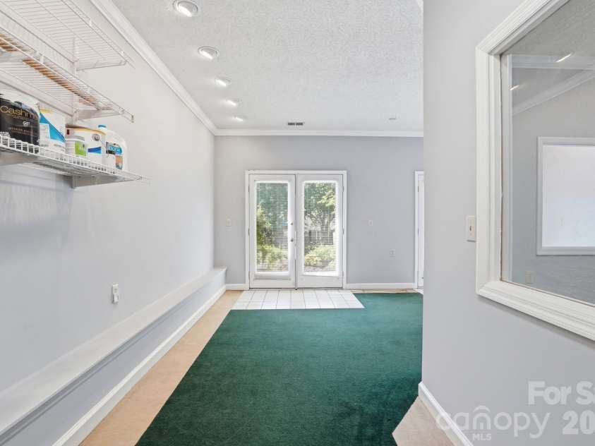 5519 Haybridge Road, Charlotte, NC 28269.  MLS# CAR4363610, YatesRealty ID 30638. Converted Garage