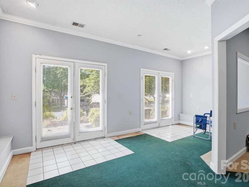 5519 Haybridge Road, Charlotte, NC 28269.  MLS# CAR4363610, YatesRealty ID 30638. Converted Garage