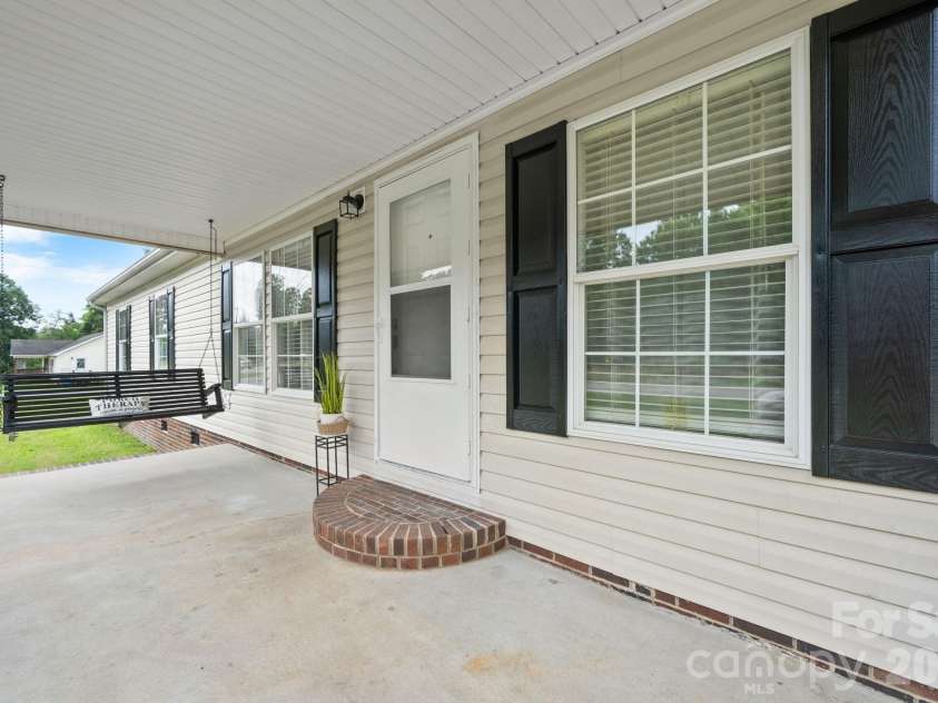 150 Bost Nursery Road, Maiden, NC 28650.  MLS# CAR4388448, YatesRealty ID 30643. Inviting Front Porch with Swing