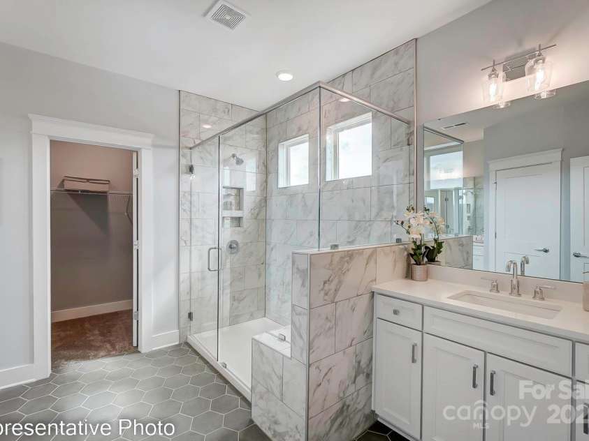 1247 Carrington Drive, Stanley, NC 28164.  MLS# CAR4285193, YatesRealty ID 30649. This home features a Luxury Shower