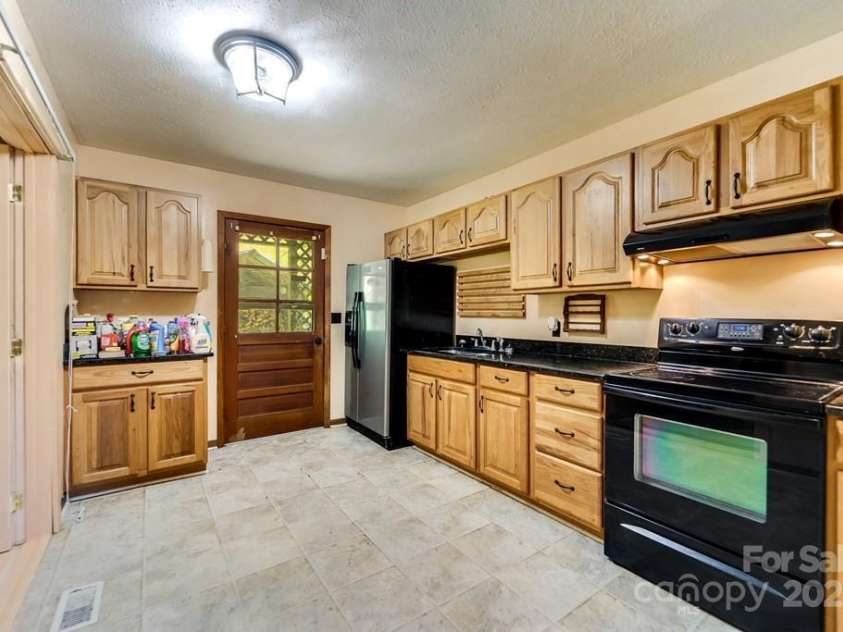 11895 Canada Road, Tuckasegee, NC 28783.  MLS# CAR4286205, YatesRealty ID 30653. 