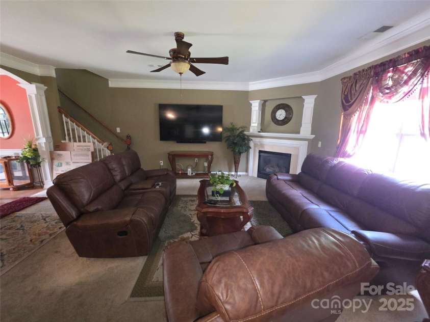 3042 Ernest Russell Court, Charlotte, NC 28269.  MLS# CAR4286579, YatesRealty ID 30655. Family room /living room