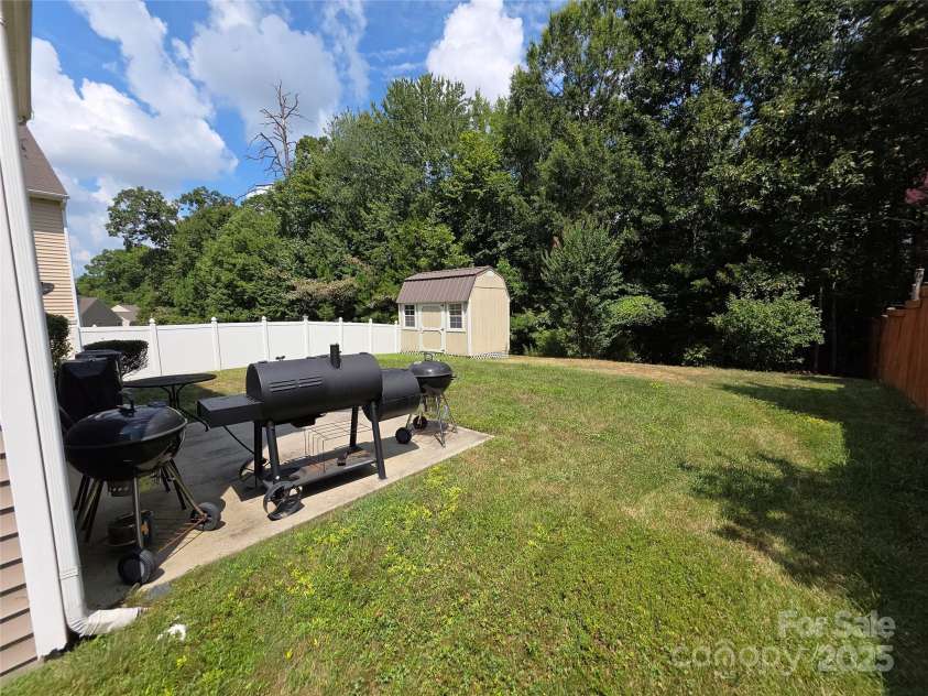 3042 Ernest Russell Court, Charlotte, NC 28269.  MLS# CAR4286579, YatesRealty ID 30655. Patio and backyard