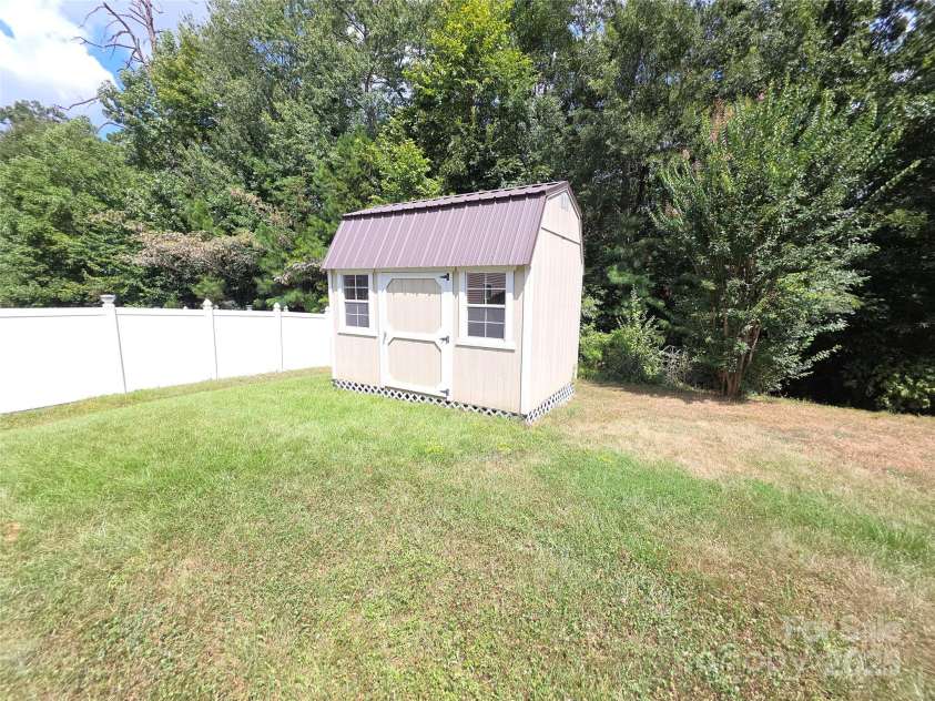 3042 Ernest Russell Court, Charlotte, NC 28269.  MLS# CAR4286579, YatesRealty ID 30655. Shed
