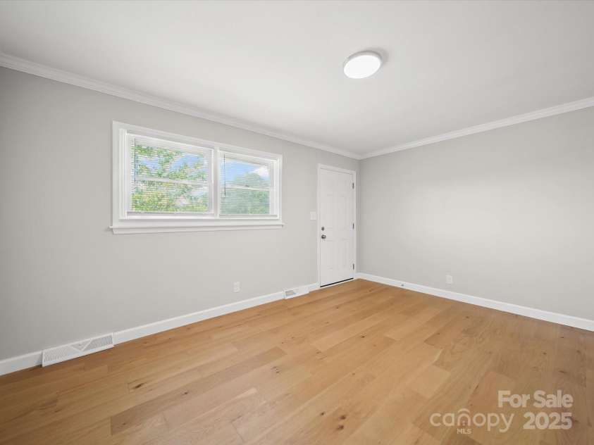 15 Woodland Drive, Polkton, NC 28135.  MLS# CAR4285291, YatesRealty ID 30657. Living Room