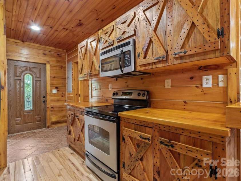 439 Upper Pig Pen Road, Green Mountain, NC 28740.  MLS# CAR4392353, YatesRealty ID 30658. 
