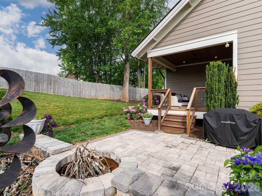 10 Starwood Valley Trail, Arden, NC 28704.  MLS# CAR4376405, YatesRealty ID 30660. Fire pit and entertaining space