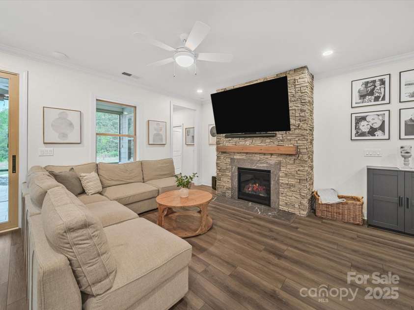 6063 Pier Drive, Denver, NC 28037.  MLS# CAR4286335, YatesRealty ID 30660. Custom stone-stacked fireplace