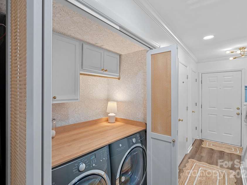 3130 Heathstead Place, Charlotte, NC 28210.  MLS# CAR4288251, YatesRealty ID 30665. Laundry with new doors
