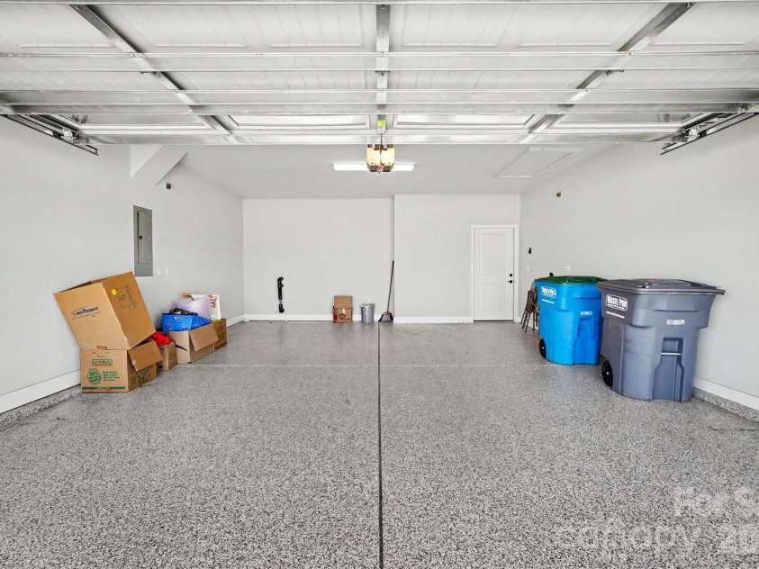 1949 Sparkling Stream Drive, Belmont, NC 28012.  MLS# CAR4383579, YatesRealty ID 30666. Upgraded/finished garage with epoxy.