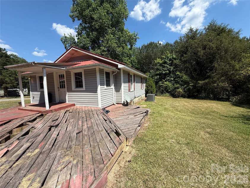 129 Sunset Drive, Troy, NC 27371.  MLS# CAR4384122, YatesRealty ID 30670. Back of house 