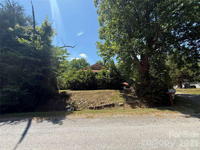 129 Sunset Drive, Troy, NC 27371.  MLS# CAR4384122, YatesRealty ID 30670. Front of house from Sunset
