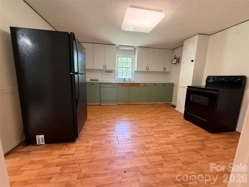 129 Sunset Drive, Troy, NC 27371.  MLS# CAR4384122, YatesRealty ID 30670. Kitchen 